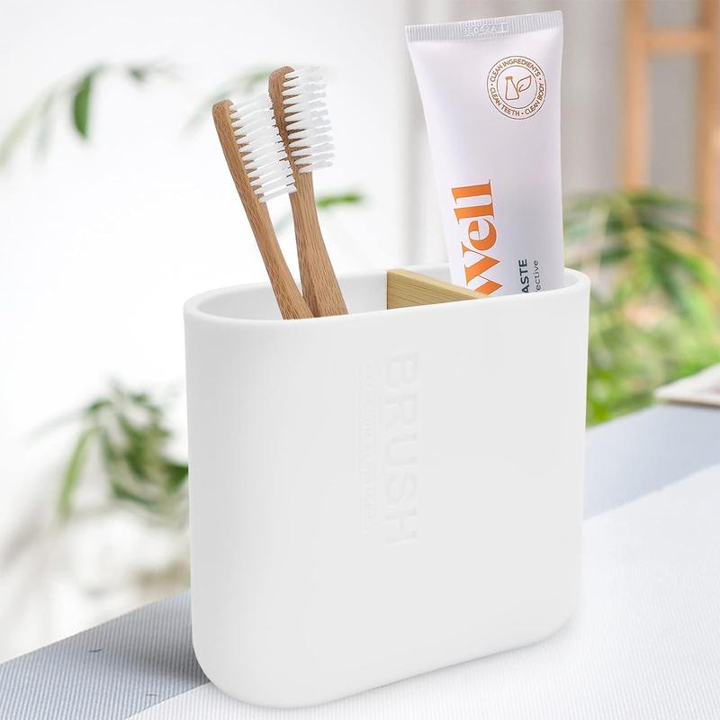 White toothbrush holder with bamboo divider. Detachable for easy cleaning. Multi-functional storage with 2 slots for electric toothbrush and toothpaste. Organizer for bathroom vanity, sink, countertop.